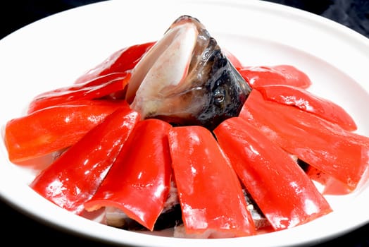 Chinese Food:Fish Head with Red Pepper in a white plate 