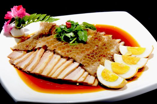 Chinese Food: Salad made of Pork and Eggs on a white plate