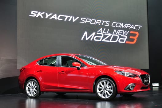 NONTHABURI - March 25: New Mazda 3 on display at The 35th Bangkok Thailand International Motor show on March 25, 2014 in Nonthaburi, Thailand.