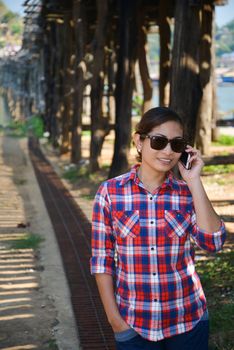 Asia women talking mobile phone