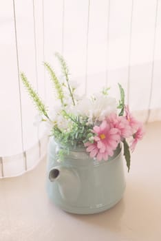 Vintage tone artificial flower on pot -  home interior