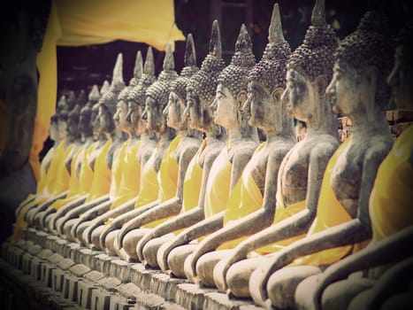 Buddha statue in Wat Yai Chai Mongkol- Ayuttaya of Thailand (Vintage tone style)