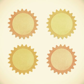 Grunge recycled paper sun on vintage tone background