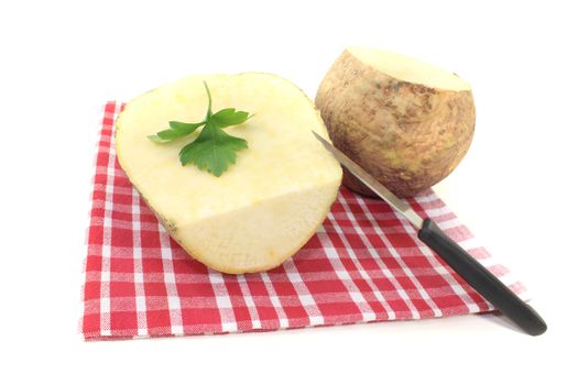 Turnip with parsley and napkin on a bright background