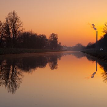 Artifical canal for river steamers in Prague at sunrise