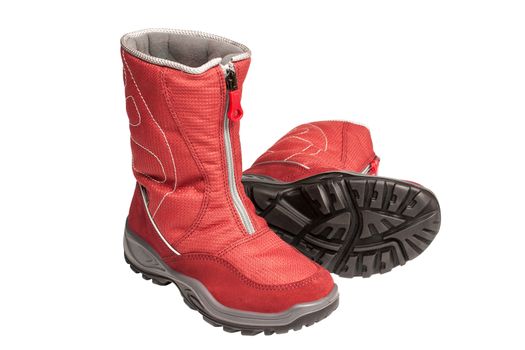 two children's red waterproof boots on a white background