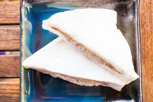 Tuna sandwiches on the plate up close, stock photo