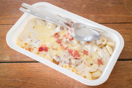 Macaroni cheese with pork ball and ham, stock photo