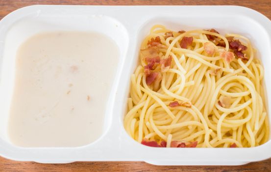 Closeup box of spaghetti carbonara, stock photo