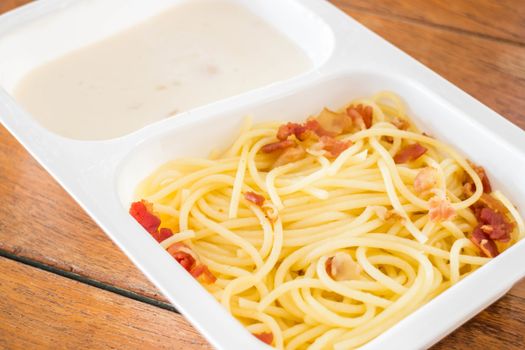 Delicious meal with spaghetti carbonara, stock photo