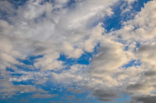 Cloudscape, Colored Clouds at Sunset near the Ocean