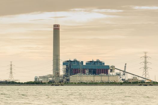 Power stations edge the sea at Rayong, Thailand.