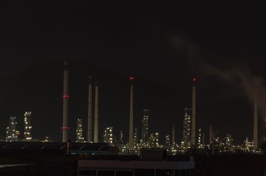 Oil refinery plant at dusk, power station