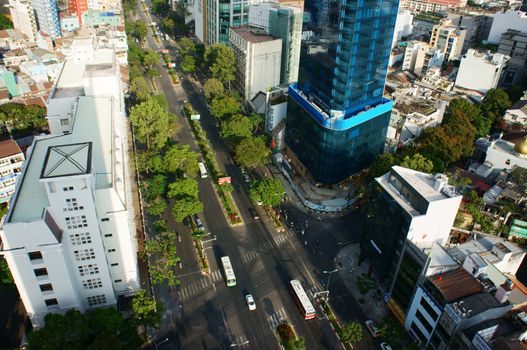 HO CHI MINH CITY, VIET NAM- MAR 23: Panoramic  Ho Chi Minh city, vietnam on day  from high view, residential, office building with green trees on road, Sai gon is big city in Vietnam, Mar 23, 2014