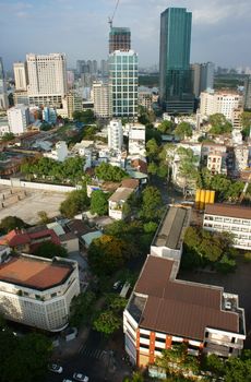 HO CHI MINH CITY, VIET NAM- MAR 23: Panoramic  Ho Chi Minh city, vietnam on day  from high view, residential, office building with green trees on road, Sai gon is big city in Vietnam, Mar 23, 2014