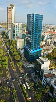 HO CHI MINH CITY, VIET NAM- MAR 23: Panoramic  Ho Chi Minh city, vietnam on day  from high view, residential, office building with green trees on road, Sai gon is big city in Vietnam, Mar 23, 2014