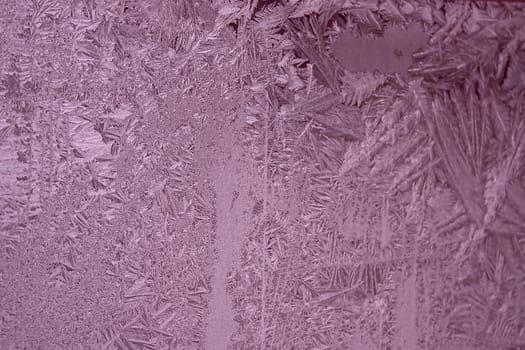 View of  frost on  glass window. Image with shallow depth of field.