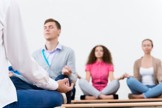 close-up of a human hand, meditates in the workplace