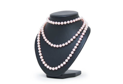 Pearl necklace on black mannequin isolated 