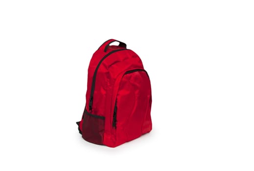 Red school backpack isolated on white