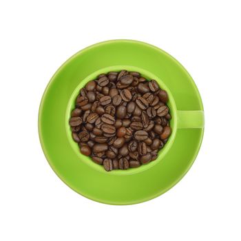 Coffee beans in a green cup. Isolated on white background