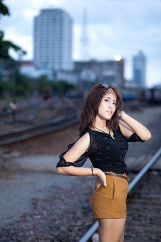 fashion portrait beauty asian girl in train station.portrait fashion outdoor.
