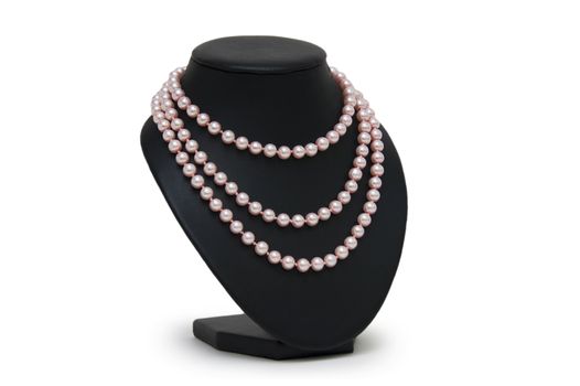 Pearl necklace on black mannequin isolated 