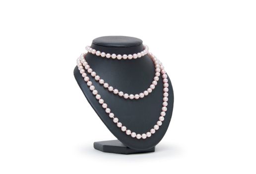 Pearl necklace on black mannequin isolated 