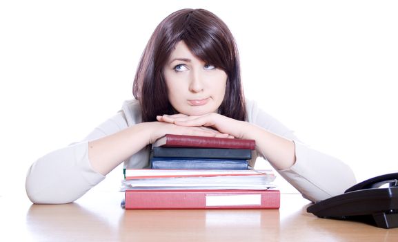 Woman sitting on the heap of files - thinking (white background).