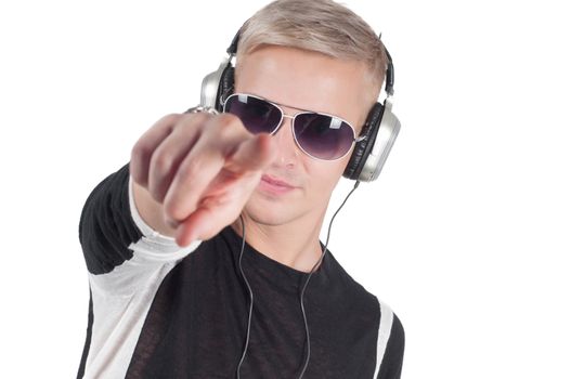Guy with headphones and sunglasses pointing his finger