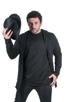 Man in black with his hat, isolated on white