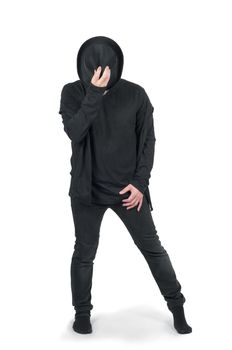 Man in black clothes dancing with his hat, isolated on white