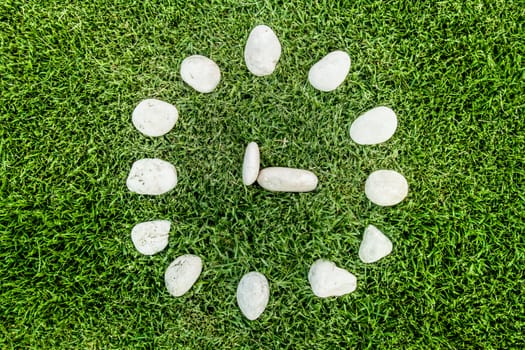 art of arranging the stone to imitate clock symbol.Its show the human tools is come from nature.