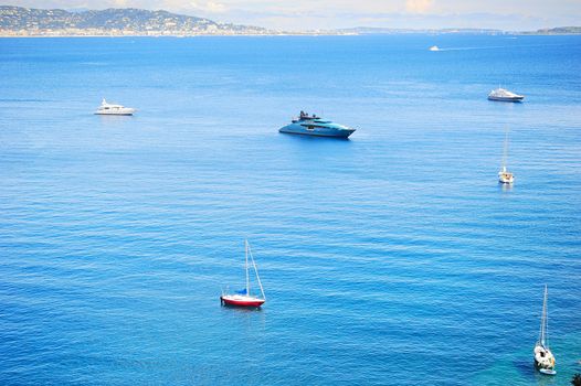 Yachts and boats in sea bay. French Riviera, Azure Coast or Cote d Azur, Provence, France 