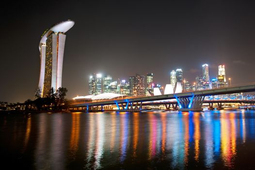 Skyline of Singapore at night with colorful neon lights