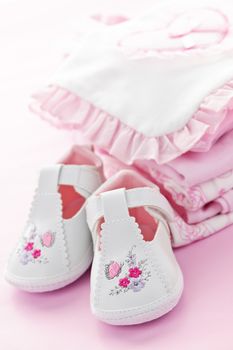 Pink infant girl clothing and shoes for baby shower