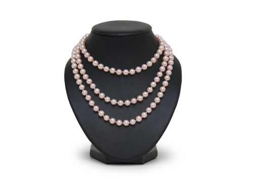 Pearl necklace on black mannequin isolated 