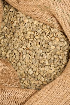 raw coffee beans in a sack