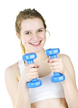 Happy fit young woman working out with weights for fitness exercise