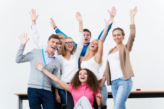 University students in the class raised their hands and having fun