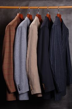 several jackets on hangers
