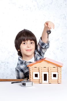 boy with the keys to your new home