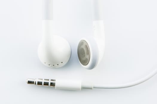 White earphones isolated on a white background