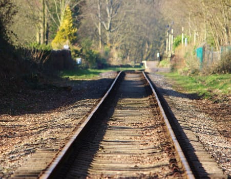 An image of a Railway track in a rural setting.