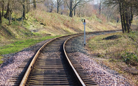 An image of a Railway track in a rural setting.