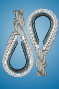  A metal ring around which a rope splice is passed to prevent chafing