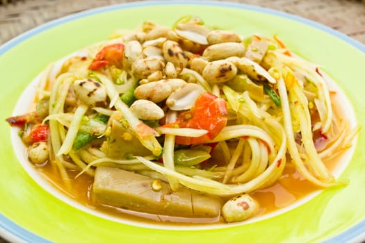 Papaya salad, Thai food, place on plate