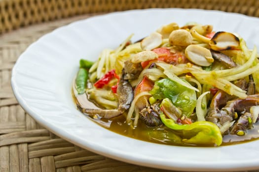 Papaya salad, Thai food, place on plate