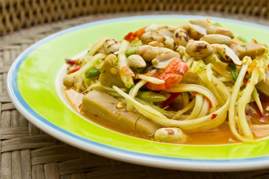 Papaya salad, Thai food, place on plate