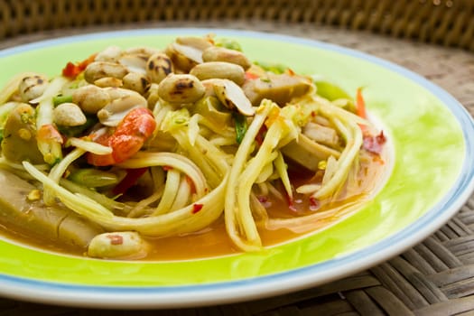 Papaya salad, Thai food, place on plate